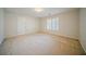 Bright bedroom with neutral carpet and shuttered window at 3968 Belle Glade Ct, Snellville, GA 30039