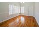 Bright dining room with hardwood floors, natural light and neutral decor at 3968 Belle Glade Ct, Snellville, GA 30039