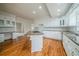 Spacious kitchen with granite countertops, a breakfast bar, and ample cabinet space at 3968 Belle Glade Ct, Snellville, GA 30039