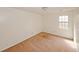 Carpeted bedroom featuring white walls and a window allowing natural light at 4161 Windermere Dr, Lithonia, GA 30038