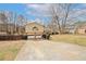 Charming two-story home with a two-car garage and a spacious driveway, ready for new owners at 4161 Windermere Dr, Lithonia, GA 30038