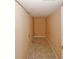Small unfinished storage room with a tiled floor at 4161 Windermere Dr, Lithonia, GA 30038