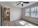 Light-filled bedroom featuring new windows and wood-look flooring at 2748 Saddle Ridge Lake Dr, Marietta, GA 30062