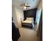 Stylish bedroom featuring a queen-sized bed, dark accent wall, and natural light at 323 Concord St, Alpharetta, GA 30009