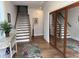 Spacious foyer with hardwood floors, staircase, and closet at 323 Concord St, Alpharetta, GA 30009