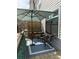 Charming patio with umbrella and seating for outdoor relaxation at 323 Concord St, Alpharetta, GA 30009