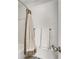 Bathroom with neutral colors and a shower/bathtub combination with towels hanging nearby at 402 Bainbridge Dr, Atlanta, GA 30327
