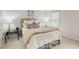 Cozy bedroom with a comfortable bed, neutral tones, and natural light from a window at 402 Bainbridge Dr, Atlanta, GA 30327