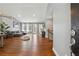 Inviting living room showcases hardwood floors, abundant natural light, and seamless open-concept design at 596 Frank Kirk Nw Rd, Kennesaw, GA 30152