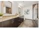 Bathroom featuring double vanity, granite countertops, a separate shower, and tile flooring at 1080 Peachtree Ne St # 2011, Atlanta, GA 30309