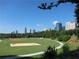 Scenic view of a city park with a volleyball court and the city skyline in the background at 1080 Peachtree Ne St # 2011, Atlanta, GA 30309