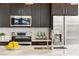 Close-up of a contemporary kitchen with premium appliances and sleek cabinetry at 1080 Peachtree Ne St # 2011, Atlanta, GA 30309