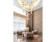 Inviting lounge area with modern furnishings, textured walls, and stylish lighting fixtures at 1080 Peachtree Ne St # 2011, Atlanta, GA 30309