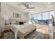Bright main bedroom boasts a seating area and incredible natural light at 1080 Peachtree Ne St # 2011, Atlanta, GA 30309