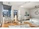 Sun-filled main bedroom features modern decor and a large window with views of the city skyline at 1080 Peachtree Ne St # 2011, Atlanta, GA 30309