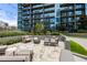 Outdoor lounge featuring patio furniture, landscaping and views of the building at 1080 Peachtree Ne St # 2011, Atlanta, GA 30309