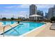 Rooftop pool with lounge chairs and city views, perfect for relaxation and recreation at 1080 Peachtree Ne St # 2011, Atlanta, GA 30309