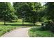 Scenic walking path surrounded by lush greenery, perfect for a peaceful stroll or run at 1080 Peachtree Ne St # 2011, Atlanta, GA 30309