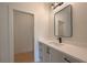 Elegant bathroom vanity with modern fixtures and a large mirror at 115 Alcovy Ter, Alpharetta, GA 30009