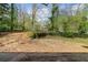 Exterior view of the home's backyard area at 1179 Aleamo Dr, Marietta, GA 30062