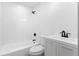 Bathroom with a white subway tiled shower and black fixtures and hardware at 1179 Aleamo Dr, Marietta, GA 30062