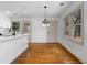 Eat-in dining area featuring hardwood floors and modern lighting at 1179 Aleamo Dr, Marietta, GA 30062