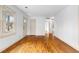 Bright living room featuring hardwood floors and a smooth transition into adjoining rooms at 1179 Aleamo Dr, Marietta, GA 30062