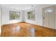 Inviting living room featuring gleaming hardwood floors, ample natural light, and neutral paint at 1179 Aleamo Dr, Marietta, GA 30062