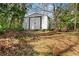 View of the backyard shed with vinyl siding at 1179 Aleamo Dr, Marietta, GA 30062