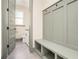 Hallway features a built-in bench with storage cubbies and access to a powder room at 662 S Grand Nw Ave, Atlanta, GA 30318