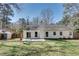 Expansive backyard with a well-maintained lawn, shed, and a patio ideal for outdoor entertainment at , Kennesaw, GA 30152