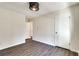 Bedroom featuring neutral paint, modern vinyl flooring, and white trim at , Kennesaw, GA 30152