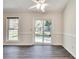 Bright dining area featuring a modern ceiling fan and a large slider leading to the backyard at , Kennesaw, GA 30152