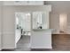 Bright kitchen area featuring white cabinetry and plenty of counter space for meal prepping at , Kennesaw, GA 30152