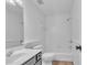Clean bathroom featuring a single sink vanity and tub-shower combination, offering a functional and well-maintained space at 1654 Summersweet Ln, Dacula, GA 30019