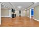 Finished basement featuring a wet bar and wood-look flooring at 1654 Summersweet Ln, Dacula, GA 30019