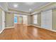 Open living room boasts hardwood floors and recessed lighting at 1654 Summersweet Ln, Dacula, GA 30019