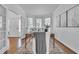 Inviting home office with natural light, hardwood floors, and refined decor for a serene workspace at 1654 Summersweet Ln, Dacula, GA 30019