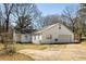 Exterior view of home with driveway and mature trees at 3480 Beech Dr, Decatur, GA 30032