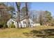 Charming single-story home with white siding and mature trees on a spacious lot at 3480 Beech Dr, Decatur, GA 30032