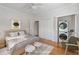 Staged bedroom with hardwood floors and a convenient stackable washer/dryer at 430 Lindbergh Ne Dr # A1, Atlanta, GA 30305