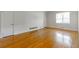 Unfurnished living room showcases hardwood floors, neutral walls, and classic architectural details at 430 Lindbergh Ne Dr # A1, Atlanta, GA 30305