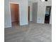 Carpeted bedroom with multiple access points to other rooms at 5175 Hanover St, Atlanta, GA 30349
