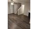 Spacious living room with laminate flooring and staircase to the next level at 5175 Hanover St, Atlanta, GA 30349