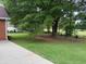 Spacious yard with tree coverage at 704 Euel Dr, Mcdonough, GA 30252