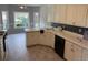 Well-lit kitchen with ample counter space and appliances at 704 Euel Dr, Mcdonough, GA 30252