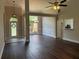Open living area with hardwood floors and abundant natural light, perfect for gatherings at 704 Euel Dr, Mcdonough, GA 30252