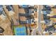 An aerial view showing the property's location within a well-planned neighborhood and tennis courts at 7630 Rambling Vale, Cumming, GA 30028