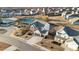 Aerial view of home showcasing the property in a neighborhood near community playground and tennis courts at 7630 Rambling Vale, Cumming, GA 30028