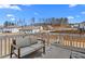 Inviting back deck with seating area, perfect for outdoor entertaining and enjoying the view of the backyard and neighborhood at 7630 Rambling Vale, Cumming, GA 30028
